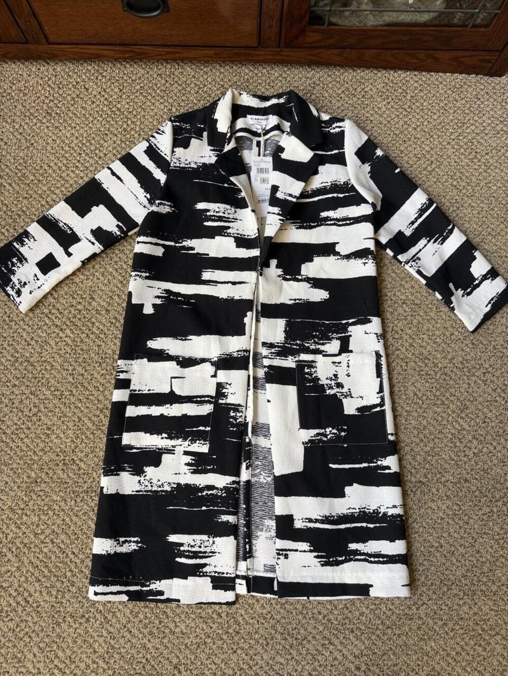 Glamorous black and white abstract brushstroke print trench coat